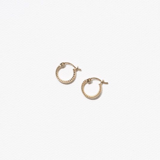 10 Karat Yellow Gold Textured Hoops Earrings by Athina Kadas. Crafted in Italy