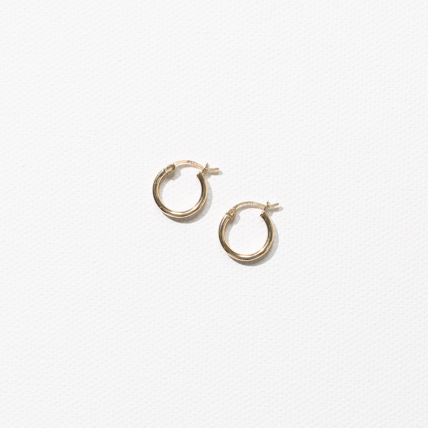 10 Karat Yellow Gold Smooth Hoops Earrings by Athina Kadas. Crafted in Italy