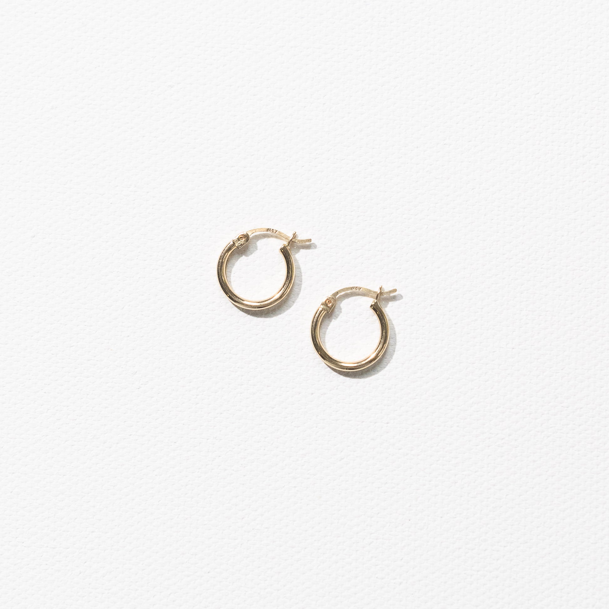 10 Karat Yellow Gold Smooth Hoops Earrings by Athina Kadas. Crafted in Italy